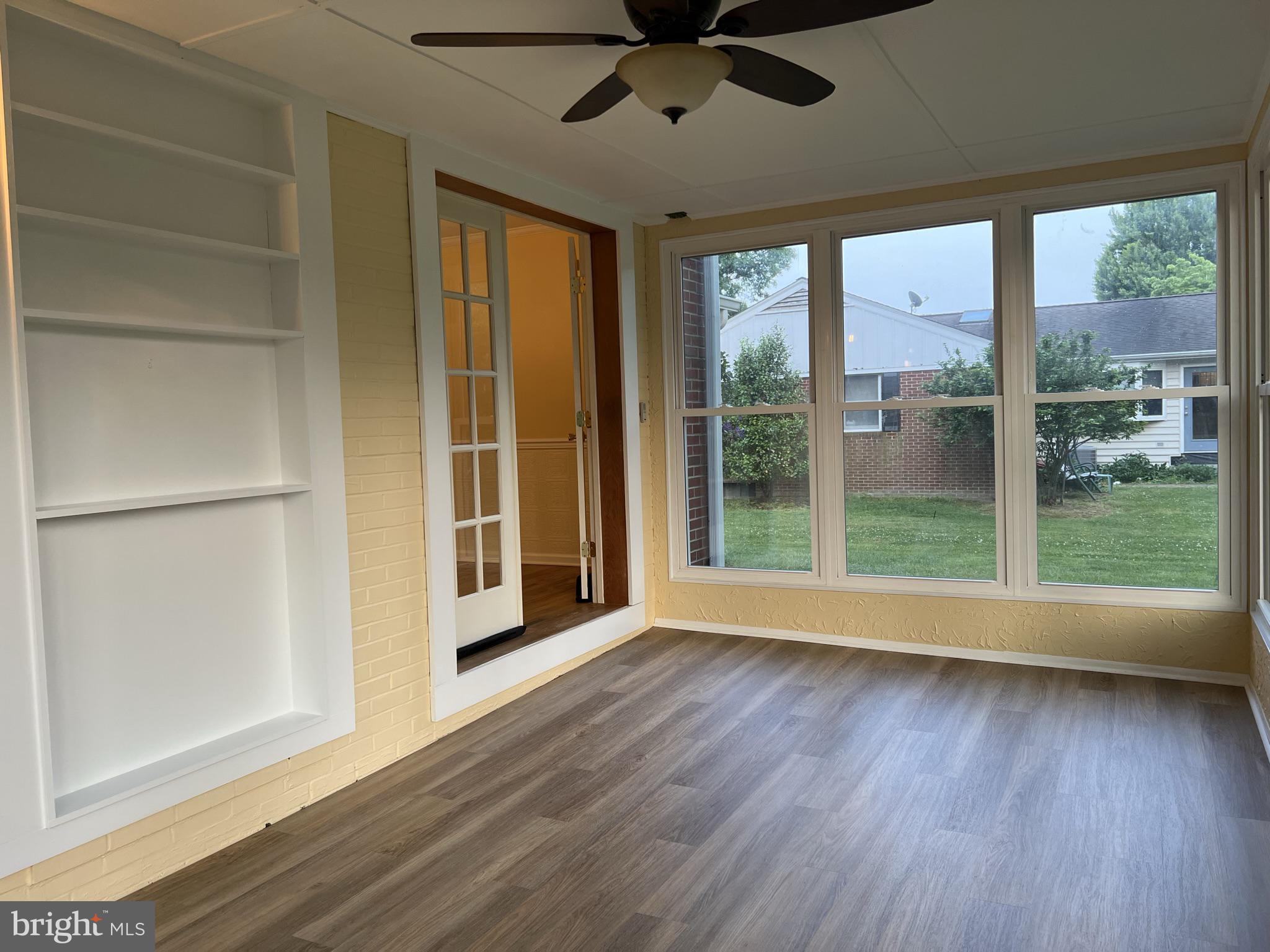104 Cedar Street Chestertown, MD 21620 - Photo 6 of 14 a view of room with window and wooden floor