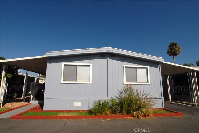 a front view of a house with yard