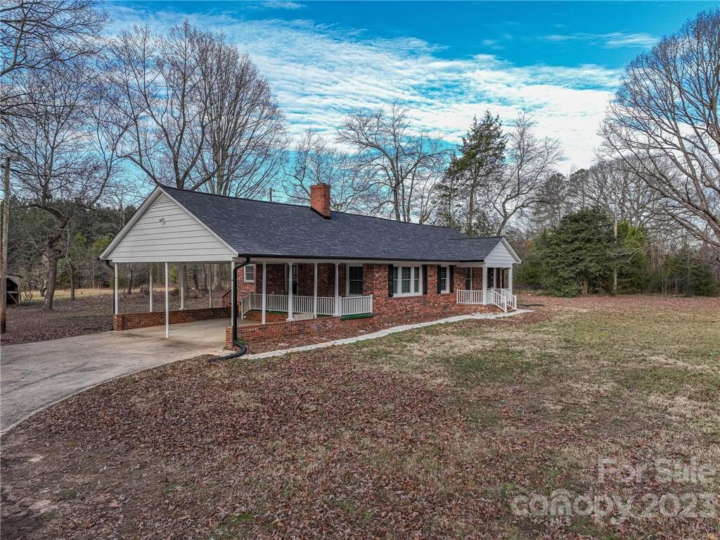 2496 Shoal Road Crouse, NC 28033 - Photo 1 of 29 a view of a house with a yard