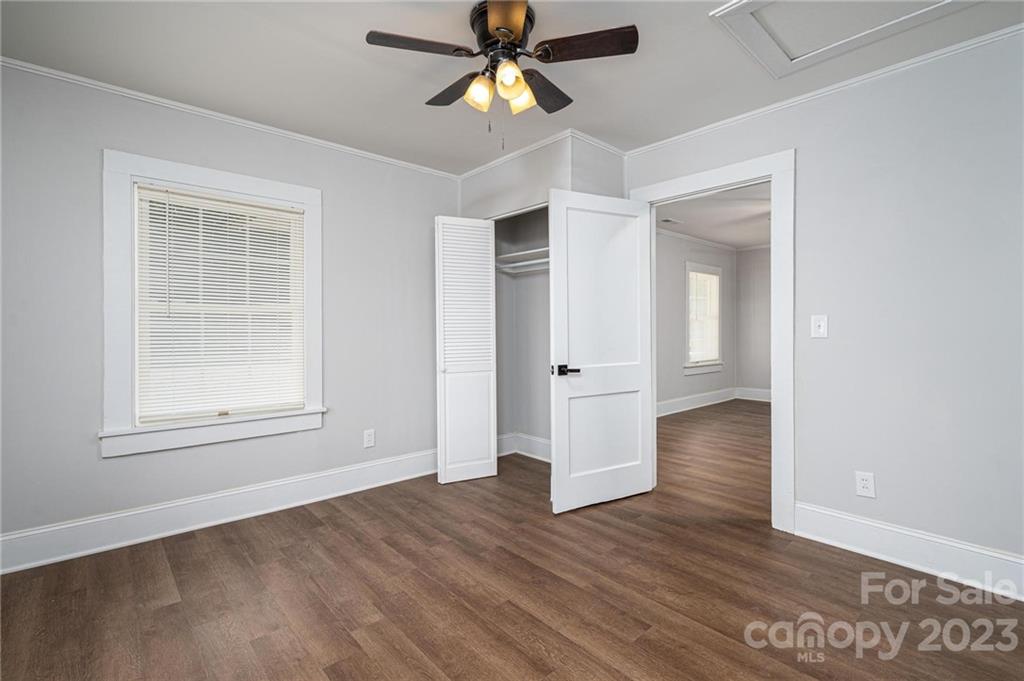 2496 Shoal Road Crouse, NC 28033 - Photo 21 of 29 wooden floor in an empty room with a window