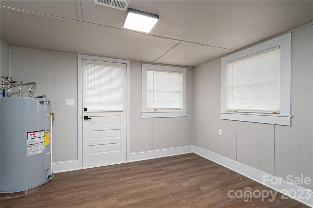 2496 Shoal Road Crouse, NC 28033 - Photo 23 of 29 an empty room with wooden floor and closet
