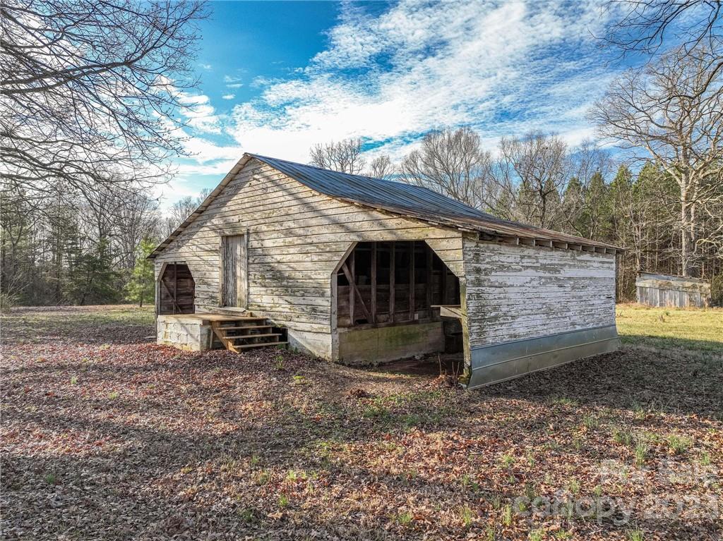 2496 Shoal Road Crouse, NC 28033 - Photo 26 of 29 a view of a house with a yard