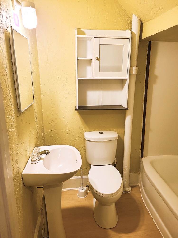 902 West 5th Street Sterling, IL 61081 - Photo 17 of 20 a bathroom with a toilet and a sink