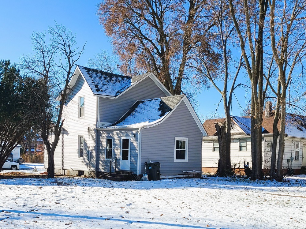 902 West 5th Street Sterling, IL 61081 - Photo 19 of 20 a view of a house with a yard