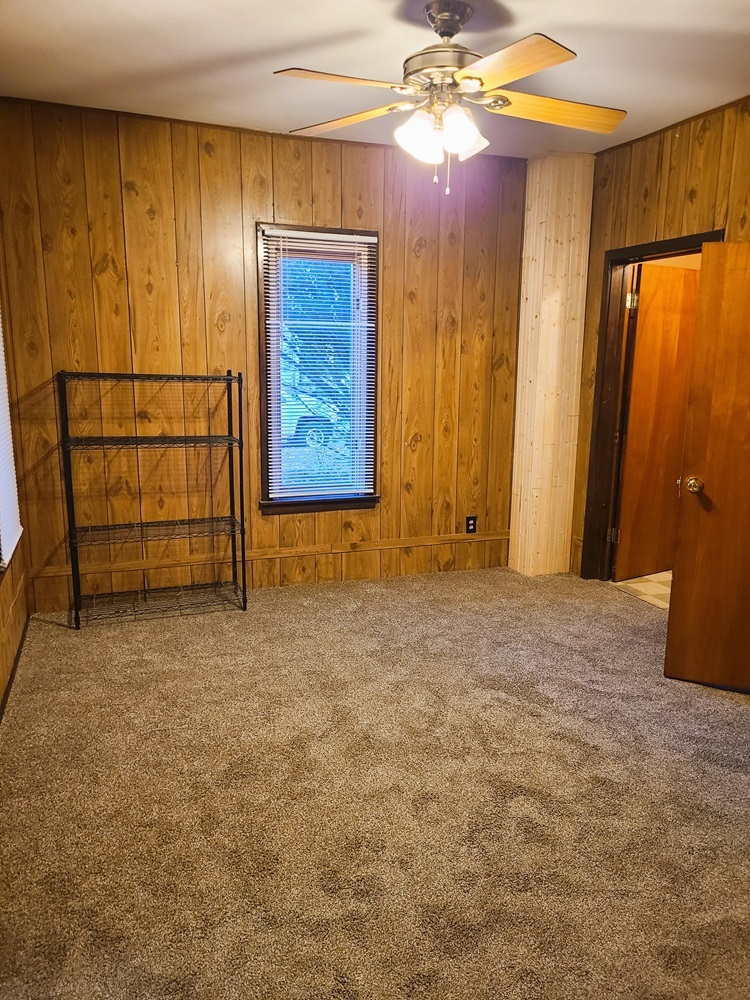 902 West 5th Street Sterling, IL 61081 - Photo 9 of 20 a view of an empty room with a window