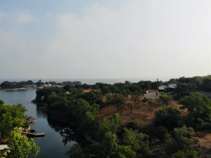 a view of lake and trees