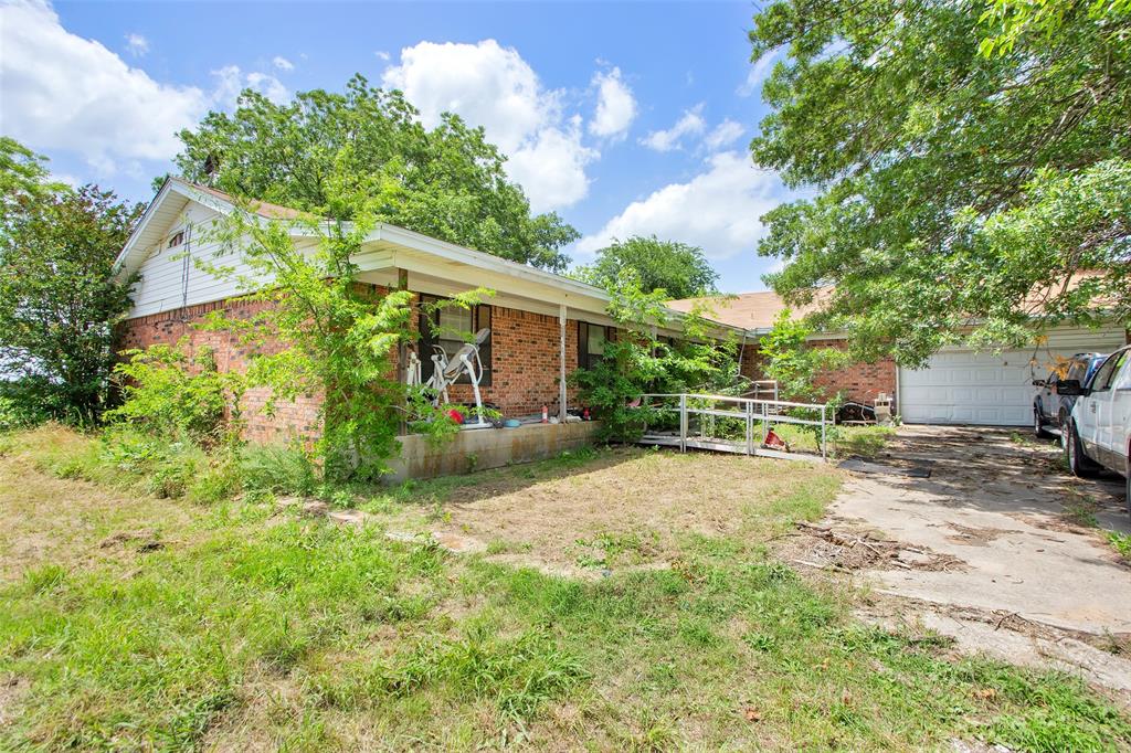 491 Morrison Road Howe, TX 75459 - Photo 10 of 19 a view of a backyard with a tree
