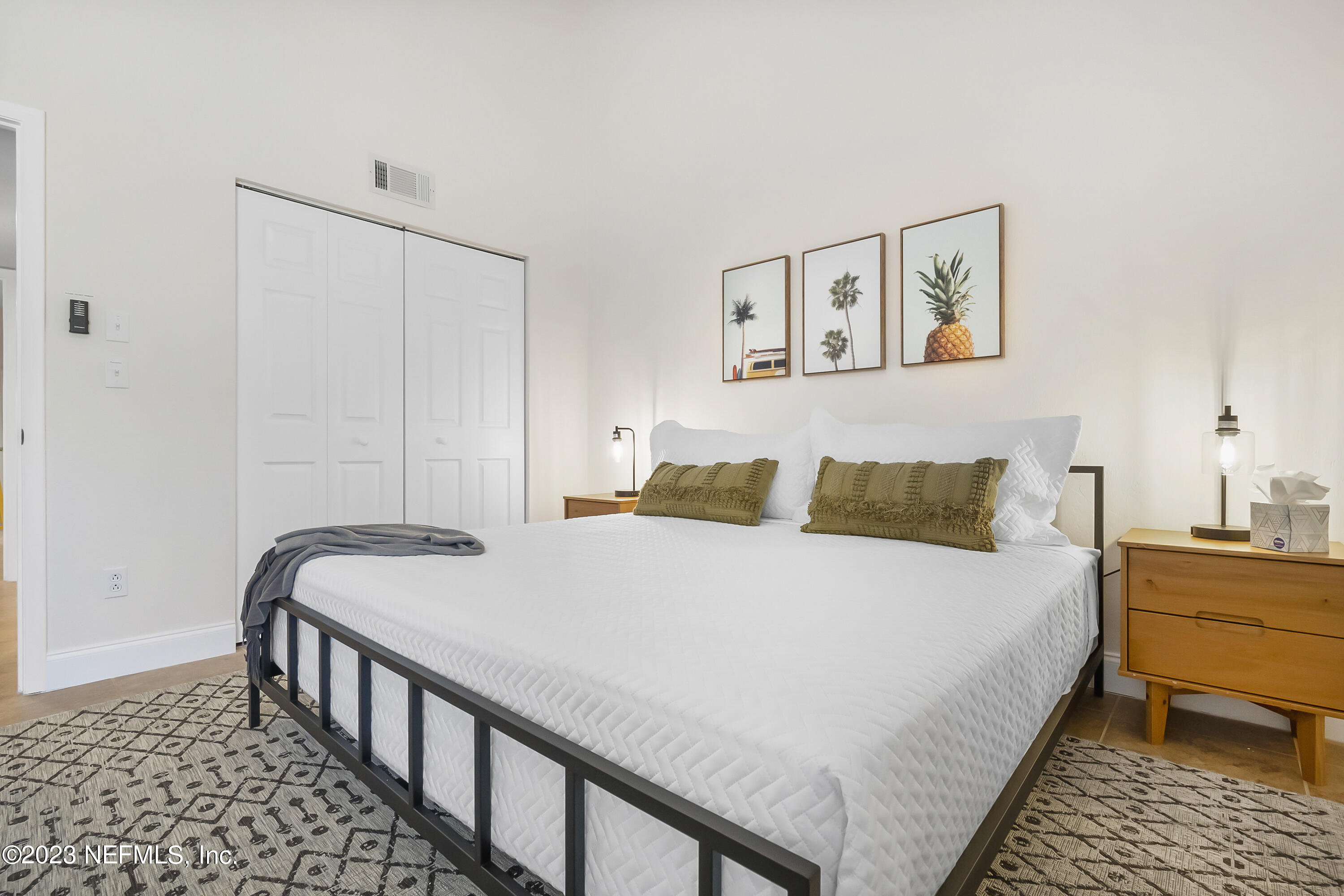 3905 Windjammer Lane St. Augustine, FL 32084 - Photo 29 of 40 a bedroom with double bed and a window