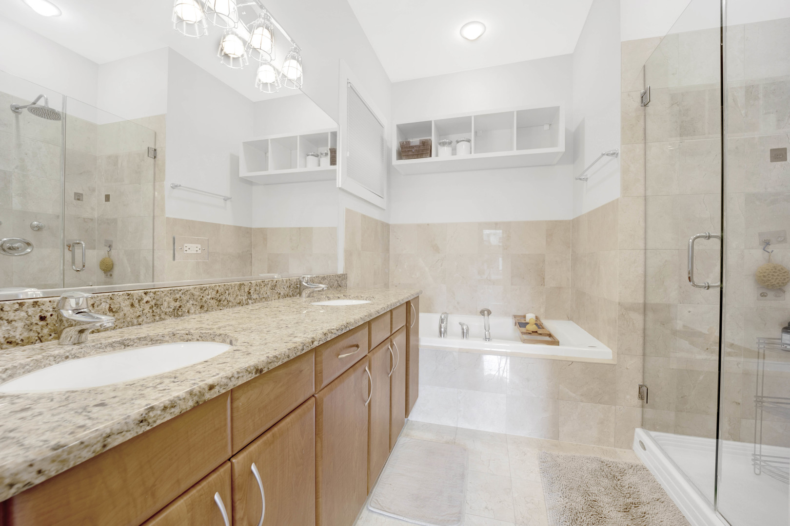 1531 West Fry Street, Unit 1 Chicago, IL 60642 - Photo 13 of 25 a bathroom with a granite countertop sink mirror and bathtub