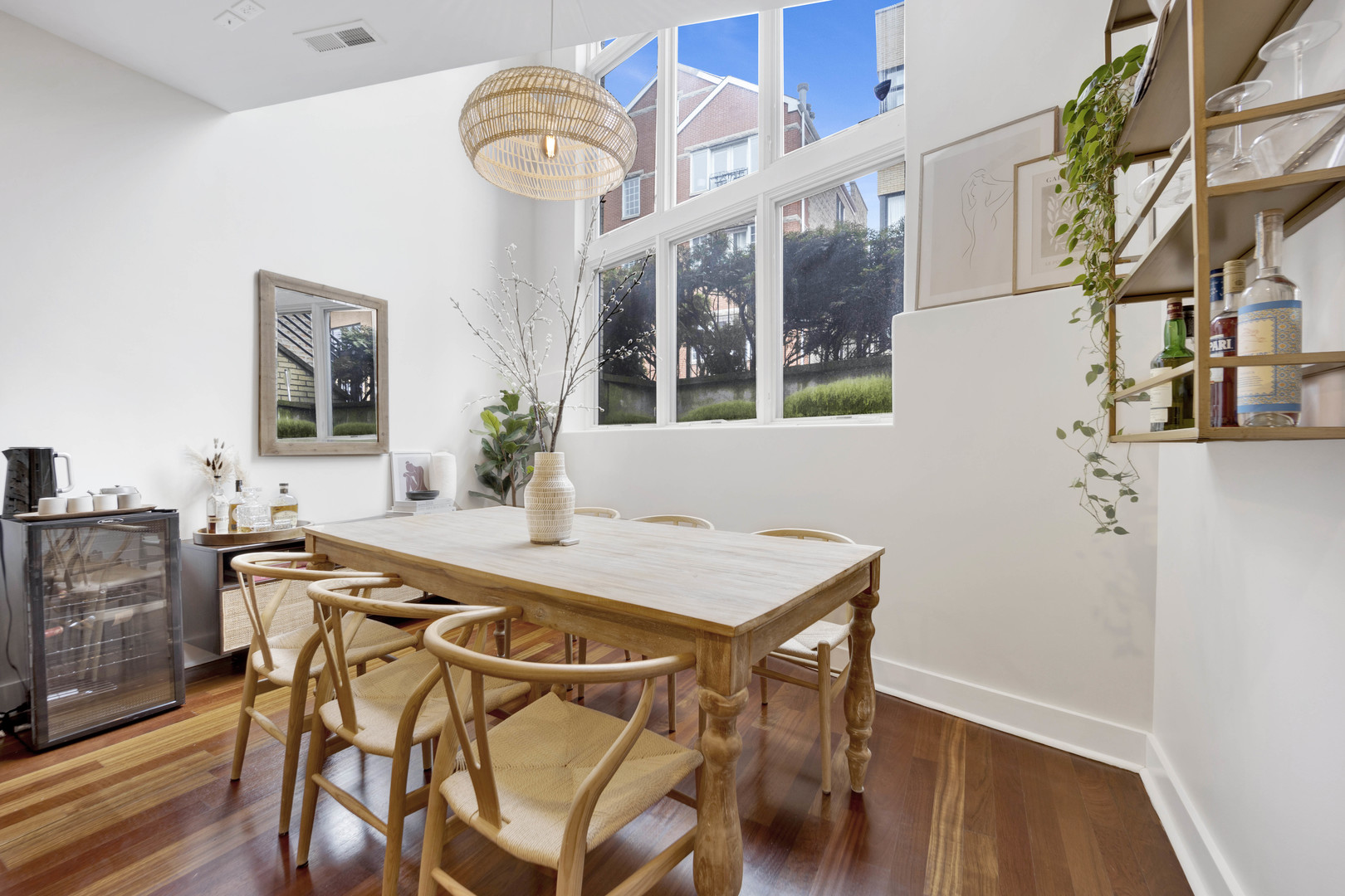 1531 West Fry Street, Unit 1 Chicago, IL 60642 - Photo 15 of 25 a view of a dining room with furniture and wooden floor