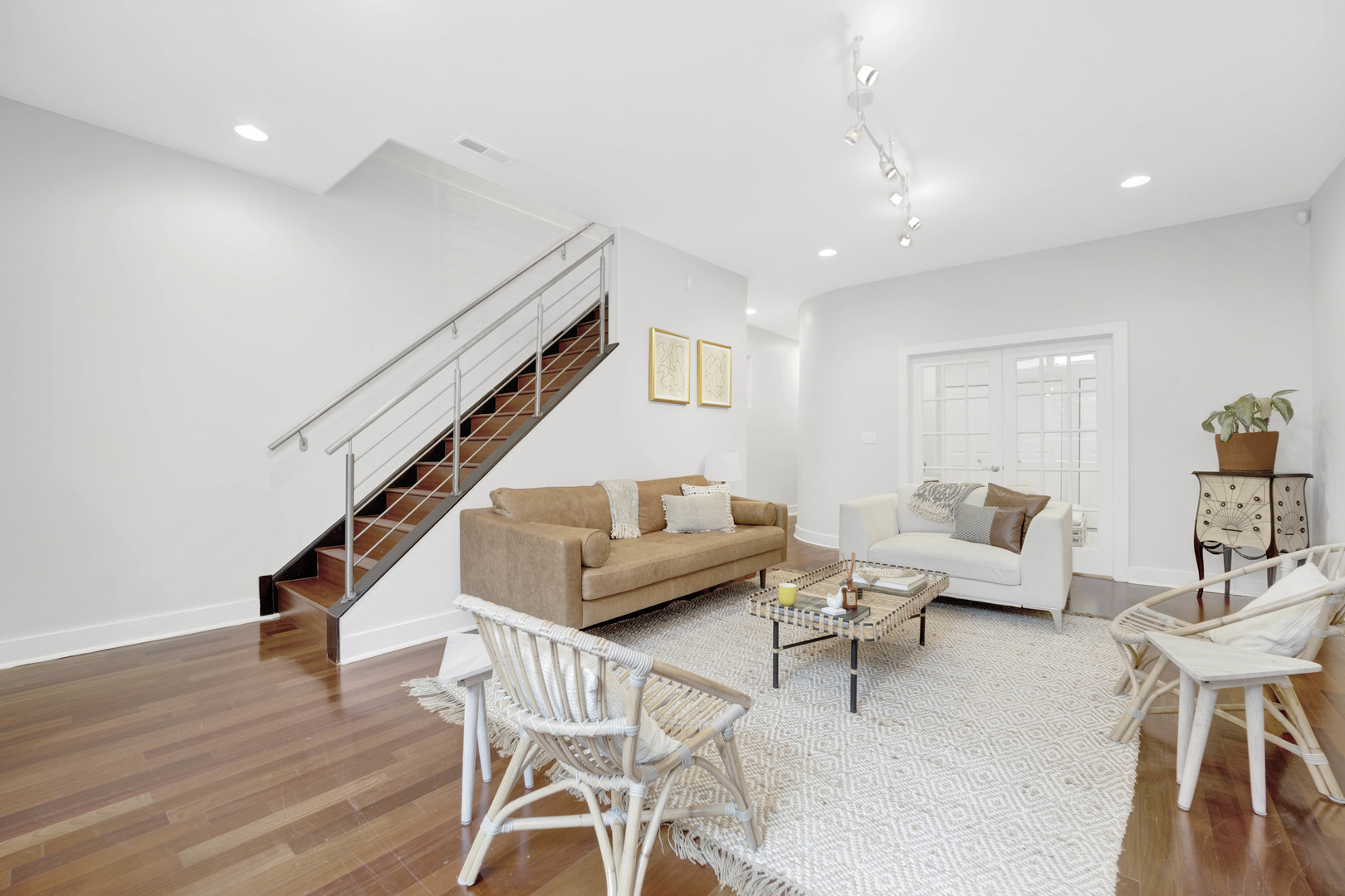 1531 West Fry Street, Unit 1 Chicago, IL 60642 - Photo 17 of 25 a living room with furniture and stairs