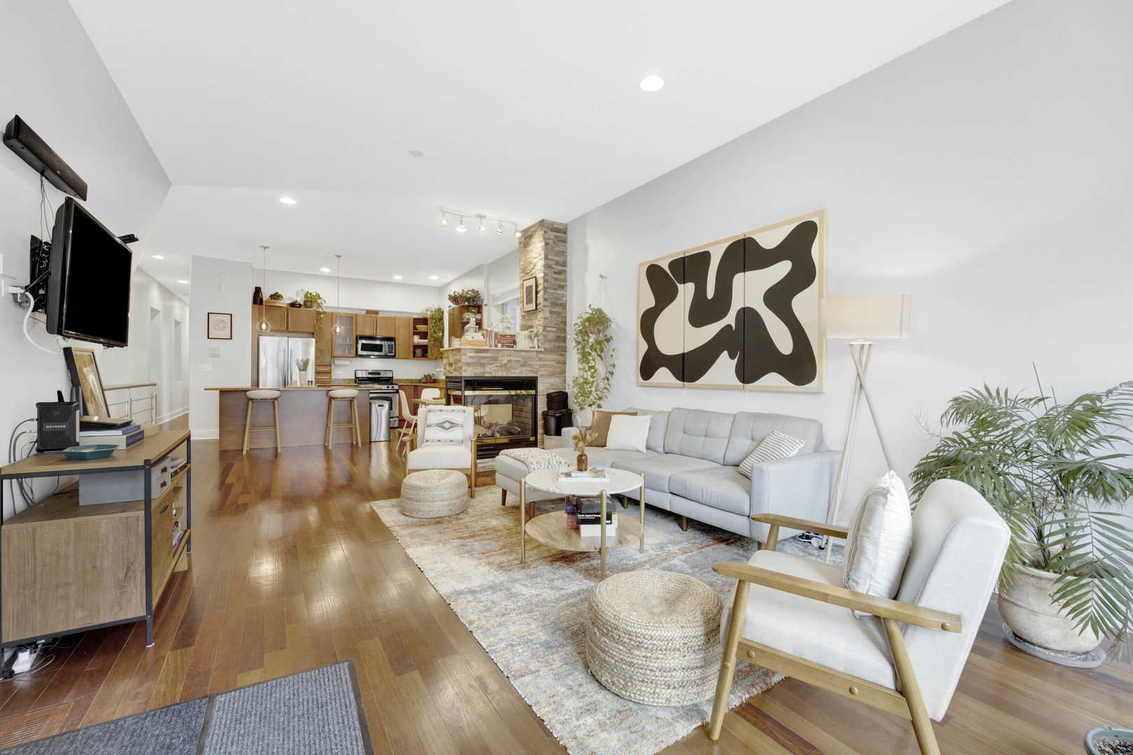 1531 West Fry Street, Unit 1 Chicago, IL 60642 - Photo 2 of 25 a living room with furniture and a flat screen tv