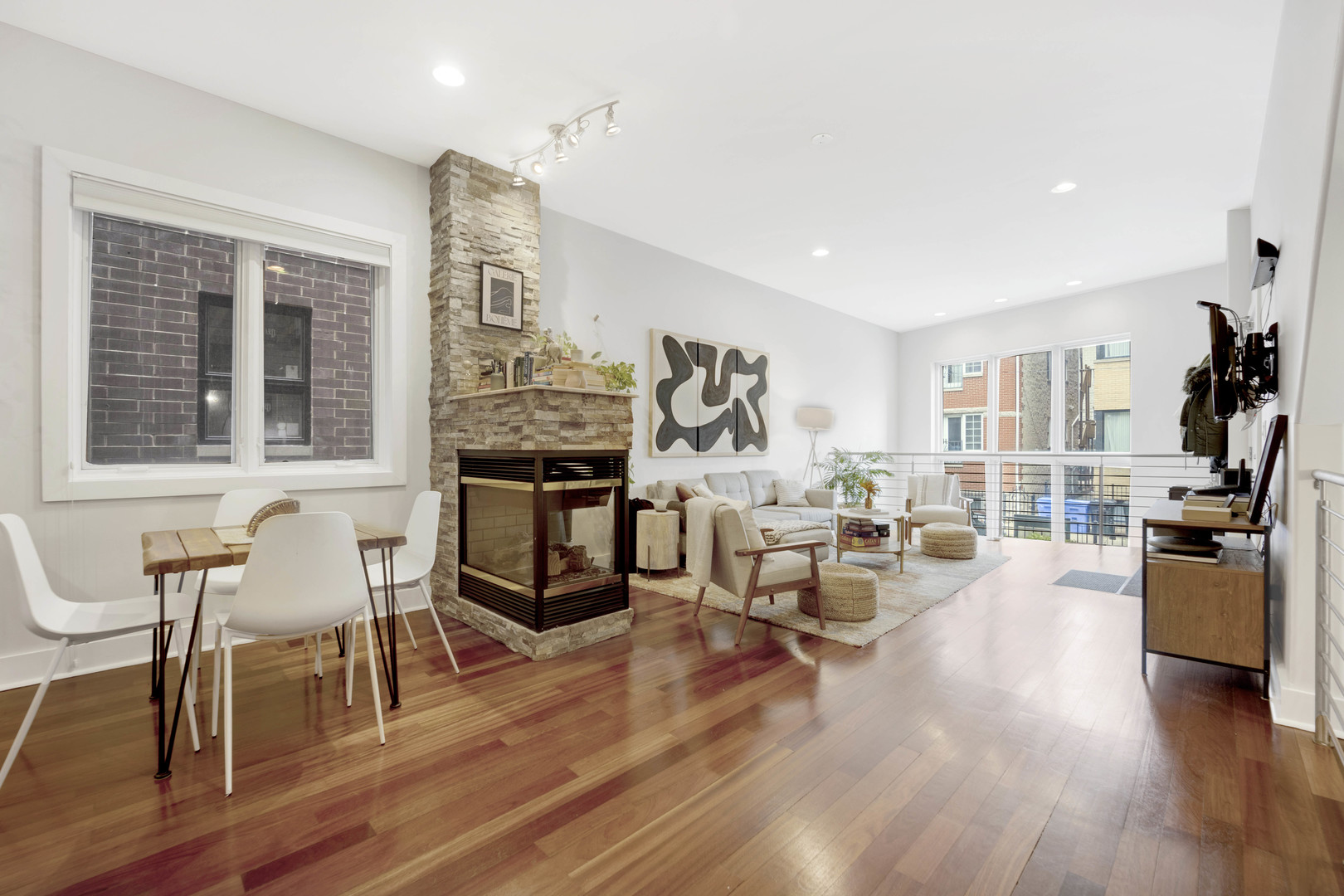 1531 West Fry Street, Unit 1 Chicago, IL 60642 - Photo 4 of 25 a living room with furniture and a wooden floor
