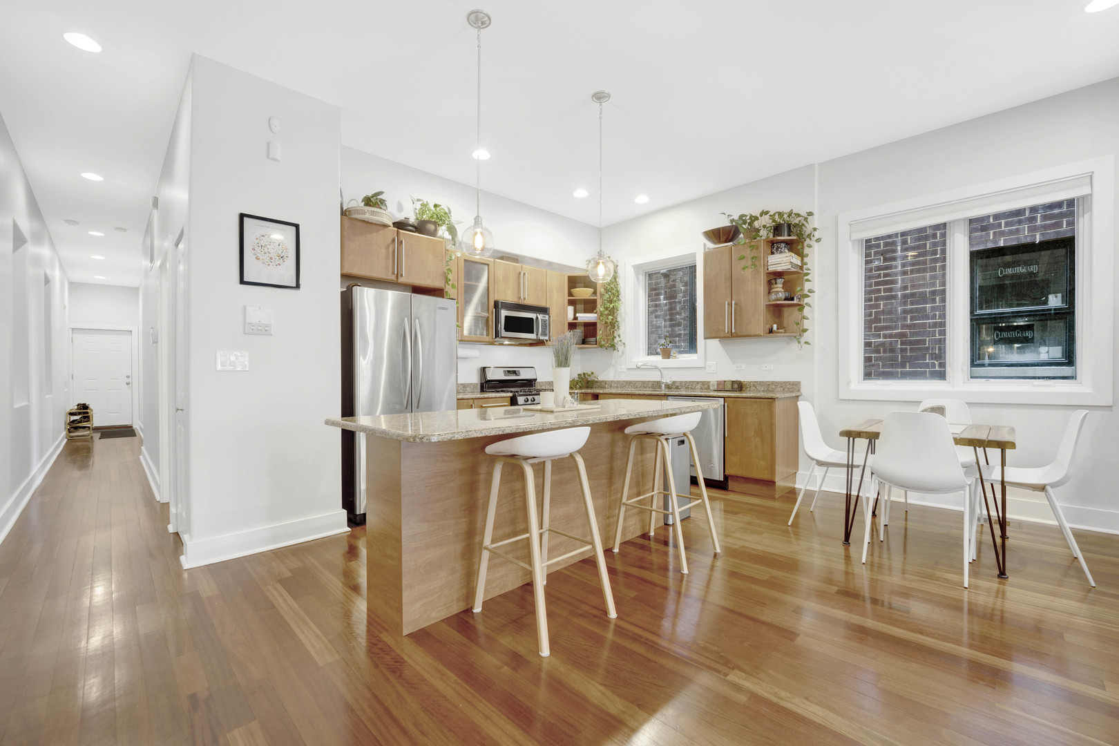 1531 West Fry Street, Unit 1 Chicago, IL 60642 - Photo 5 of 25 a view of a dining room with furniture and wooden floor