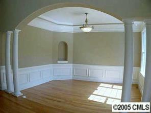 3276 Millstone Creek Road Lancaster, SC 29720 - Photo 4 of 8 a view of a room with an empty space and wooden floor