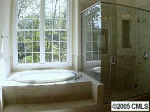 3276 Millstone Creek Road Lancaster, SC 29720 - Photo 8 of 8 a bath tub sitting next to a window