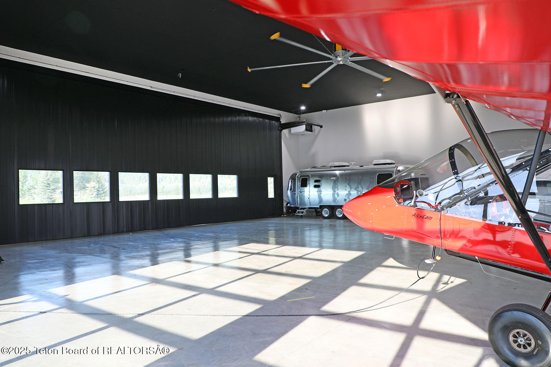 868 Diamandis Drive Alpine, WY 83128 - Photo 22 of 37 868_Diamandis_Drive_Hangar_Door