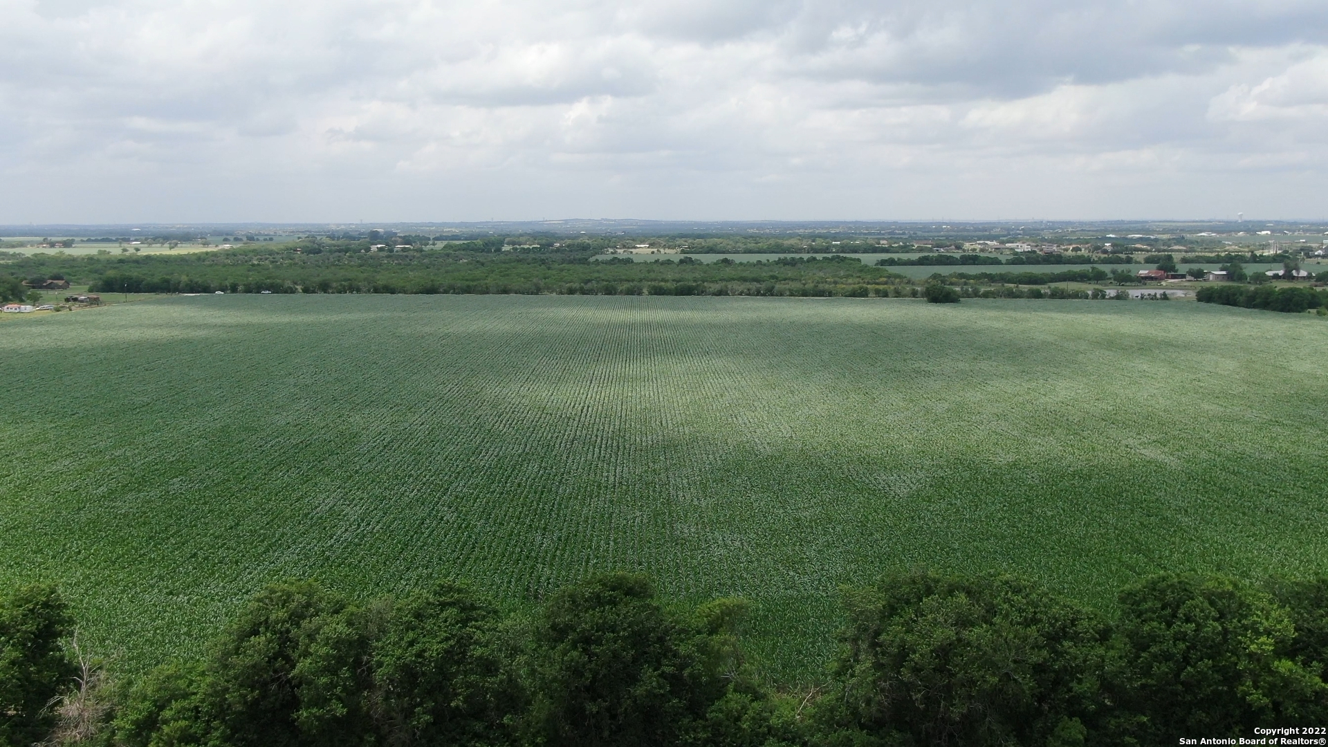 0 Schmoekel Road Cibolo, TX 78108 - Photo 3 of 8 a view of a lake with houses in the back