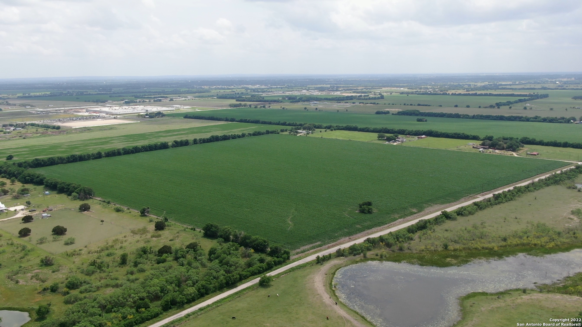 0 Schmoekel Road Cibolo, TX 78108 - Photo 7 of 8 a view of a lake with a big yard