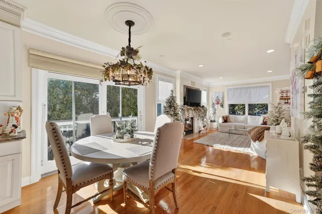 a kitchen with sink refrigerator and cabinets