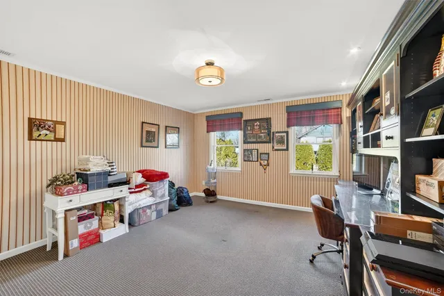 a room with furniture and natural light