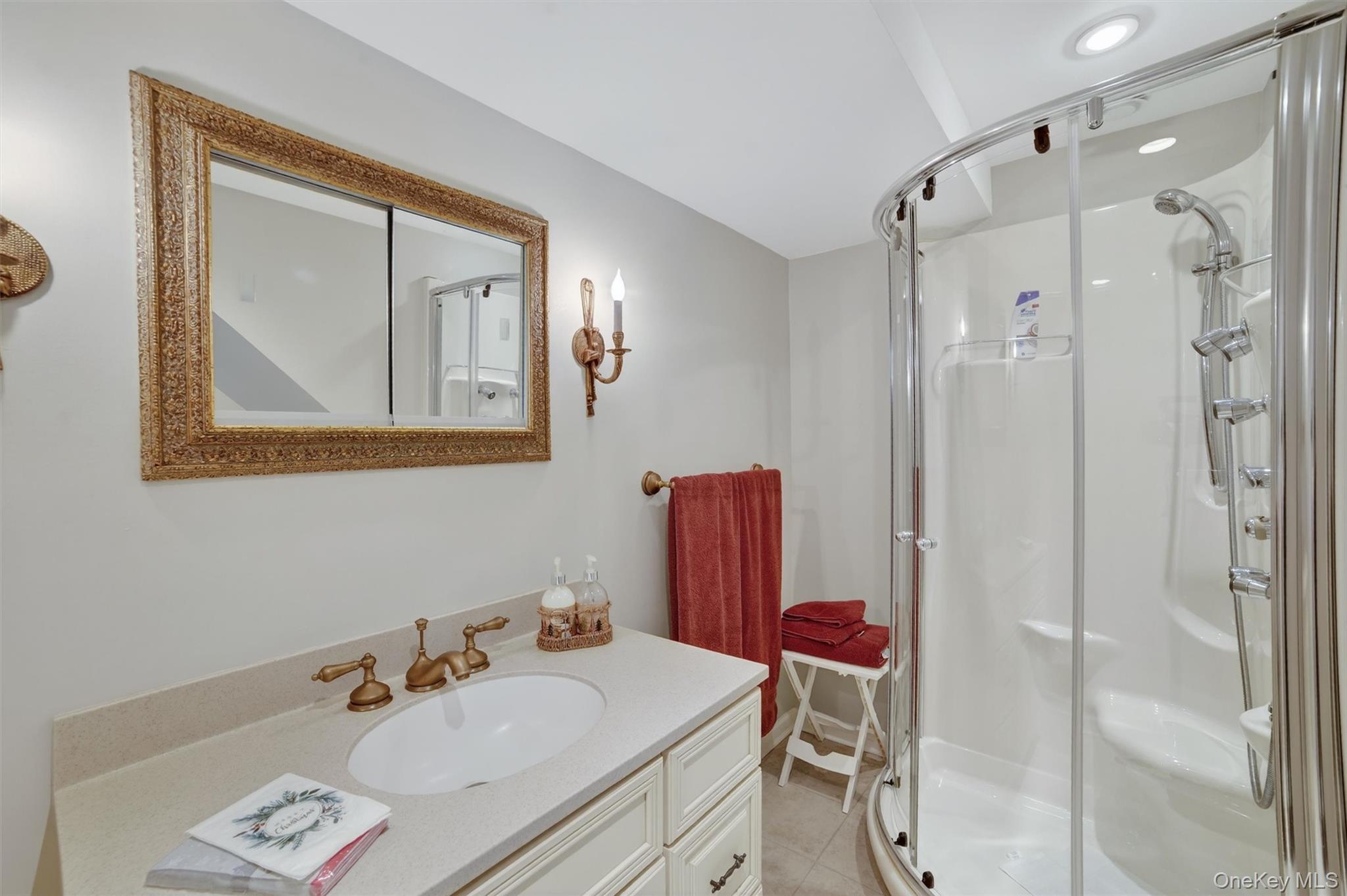 6 Rest Avenue Ardsley, NY 10502 - Photo 38 of 47 a bathroom with a sink vanity and a mirror