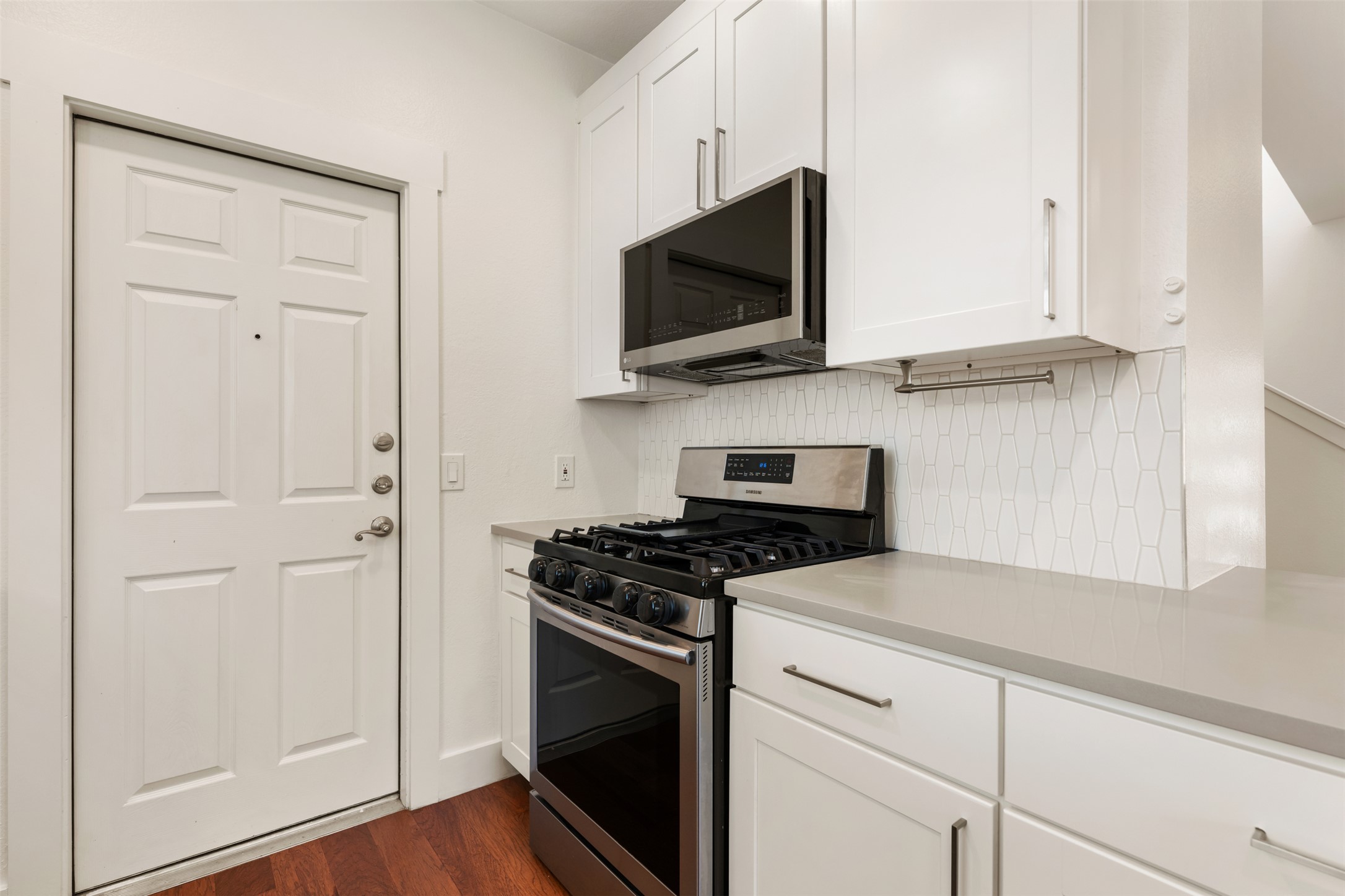 4912 Sara Drive, Unit A Austin, TX 78721 - Photo 12 of 28 Gas range and new microwave.