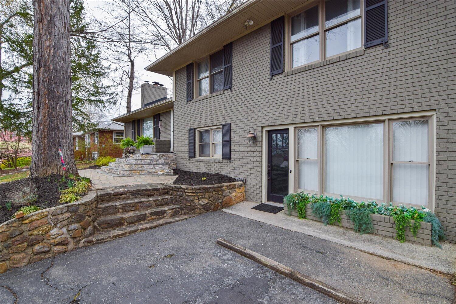 3068 Sedgefield Road Southwest Roanoke, VA 24018 - Photo 29 of 36 a front view of a house with a yard