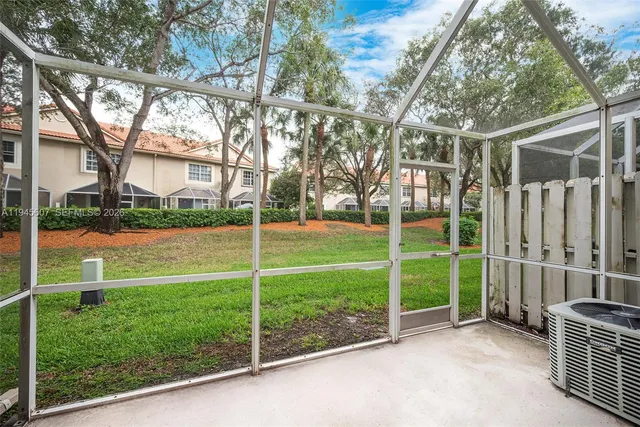 a view of a garden with an outdoor space