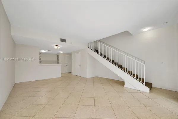 a view of an entryway with staircase