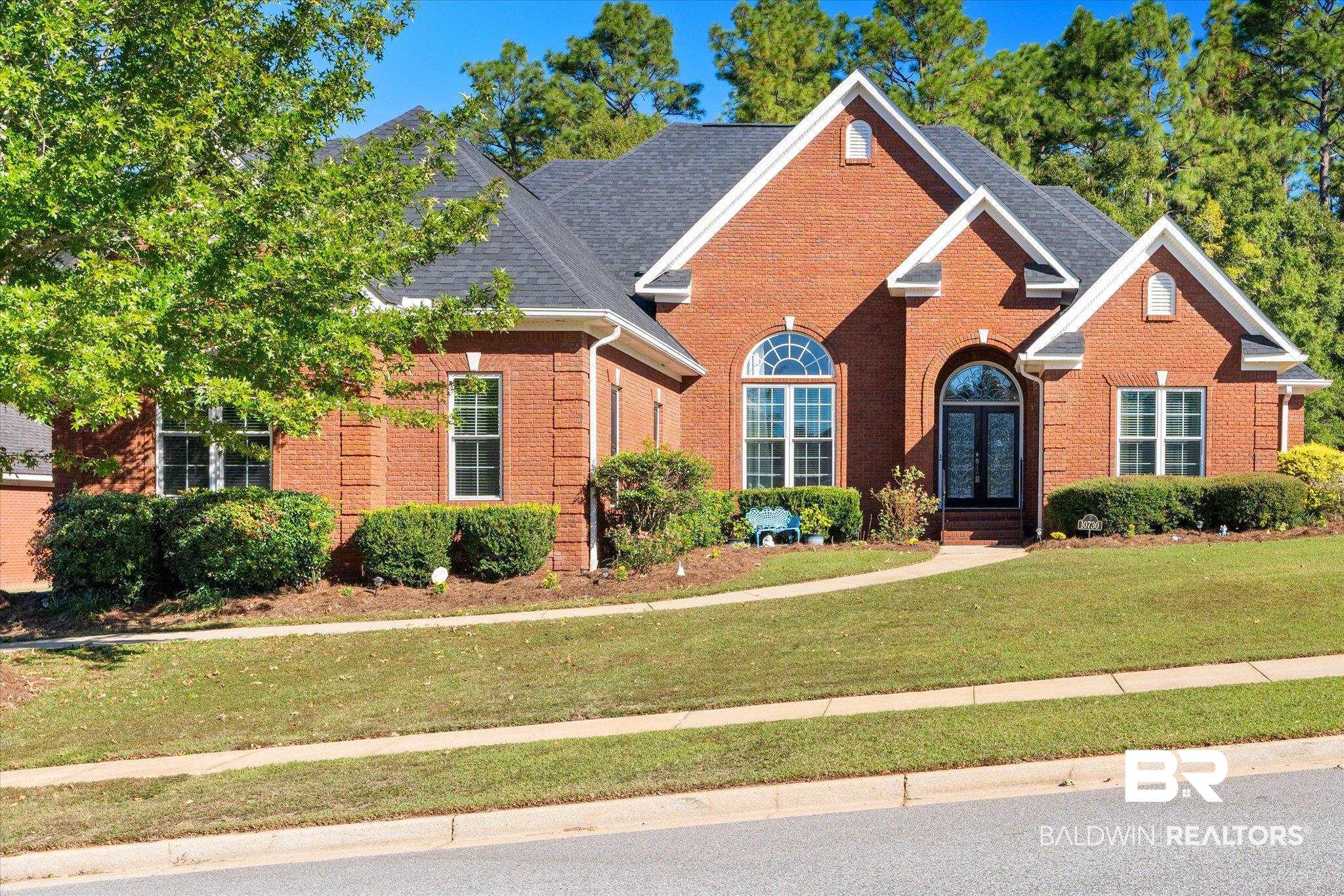10730 Flagstone Drive Mobile, AL 36608 - Photo 1 of 20 View of property featuring a front yard