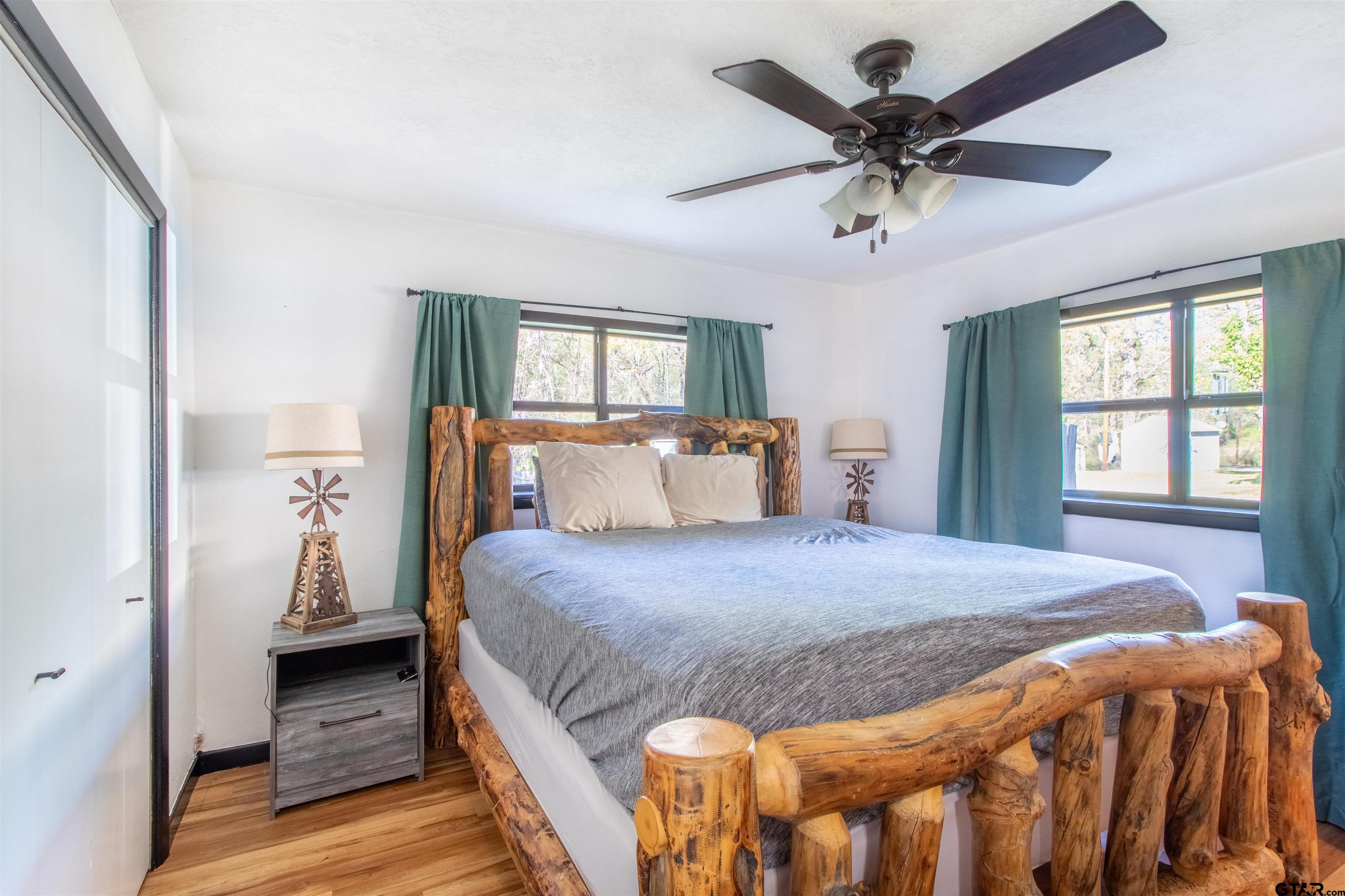 513 Lance Road Quitman, TX 75783 - Photo 16 of 27 a bedroom with a bed and window