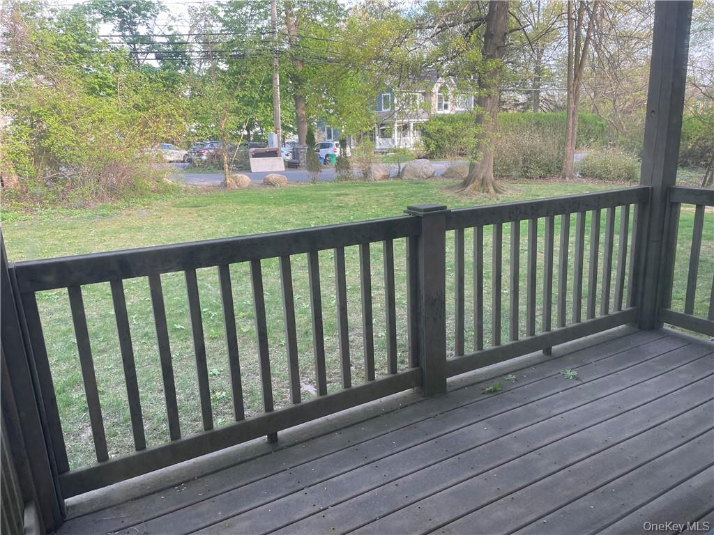 135 West Nyack Road, Unit 93 Nanuet, NY 10954 - Photo 11 of 12 a view of a balcony with wooden floor