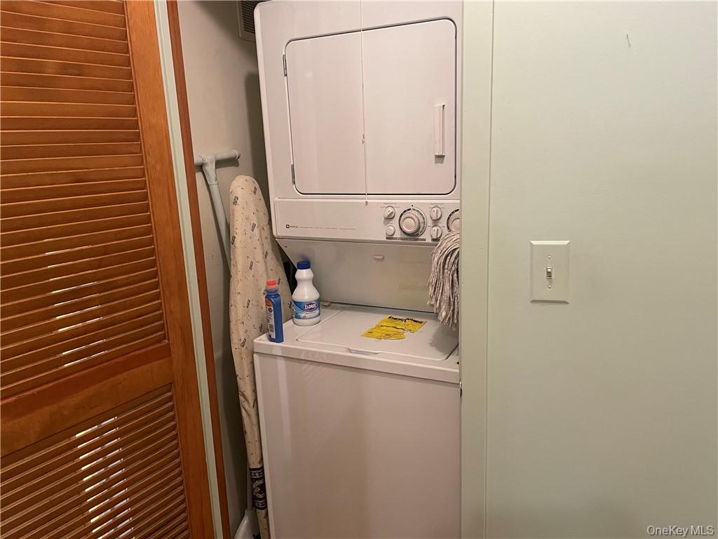 135 West Nyack Road, Unit 93 Nanuet, NY 10954 - Photo 9 of 12 a utility room with dryer and washer