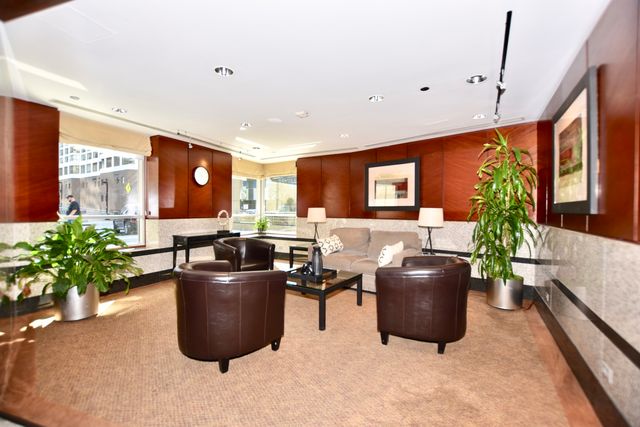 a bed room with a bed furniture and a window