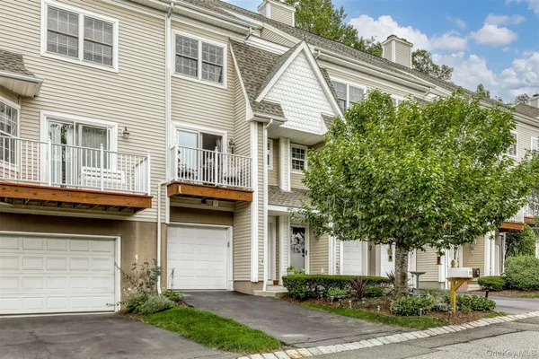 a house view with a outdoor space