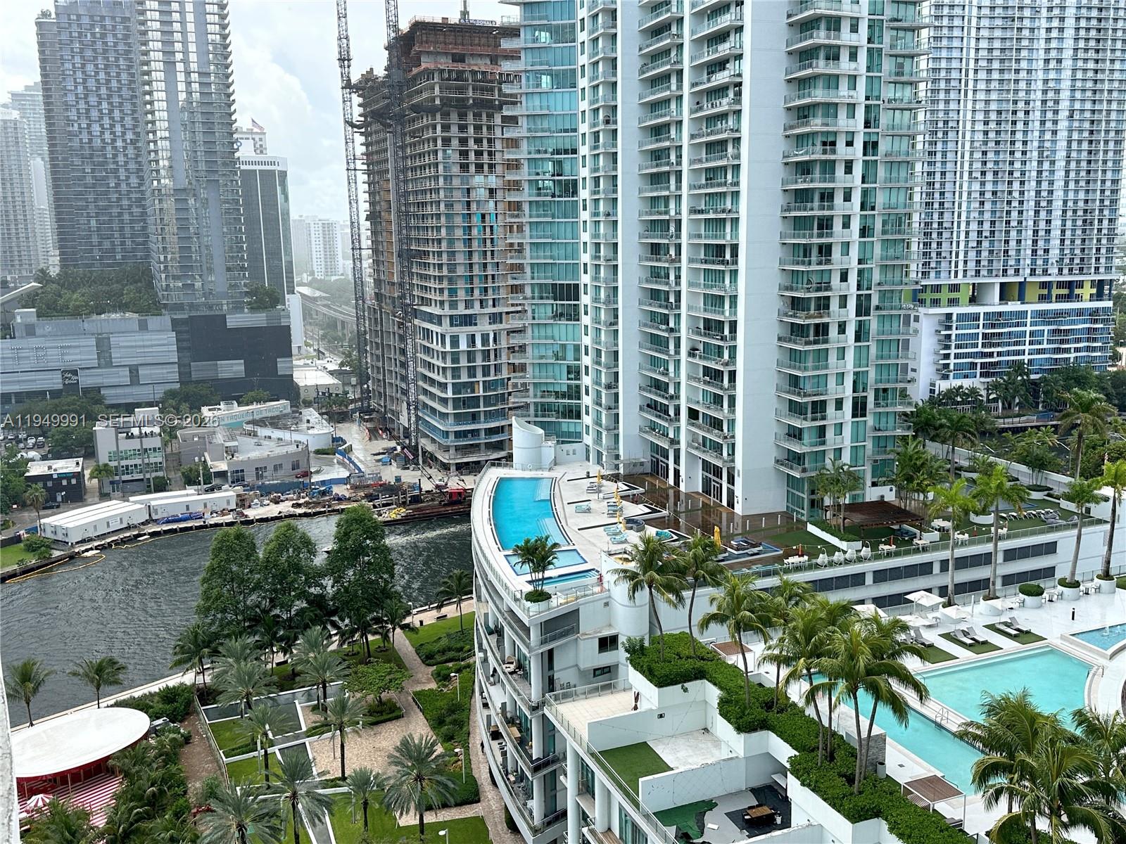 350 South Miami Avenue, Unit 2215 Miami, FL 33130 - Photo 14 of 20 a view of balcony with outdoor seating and city view