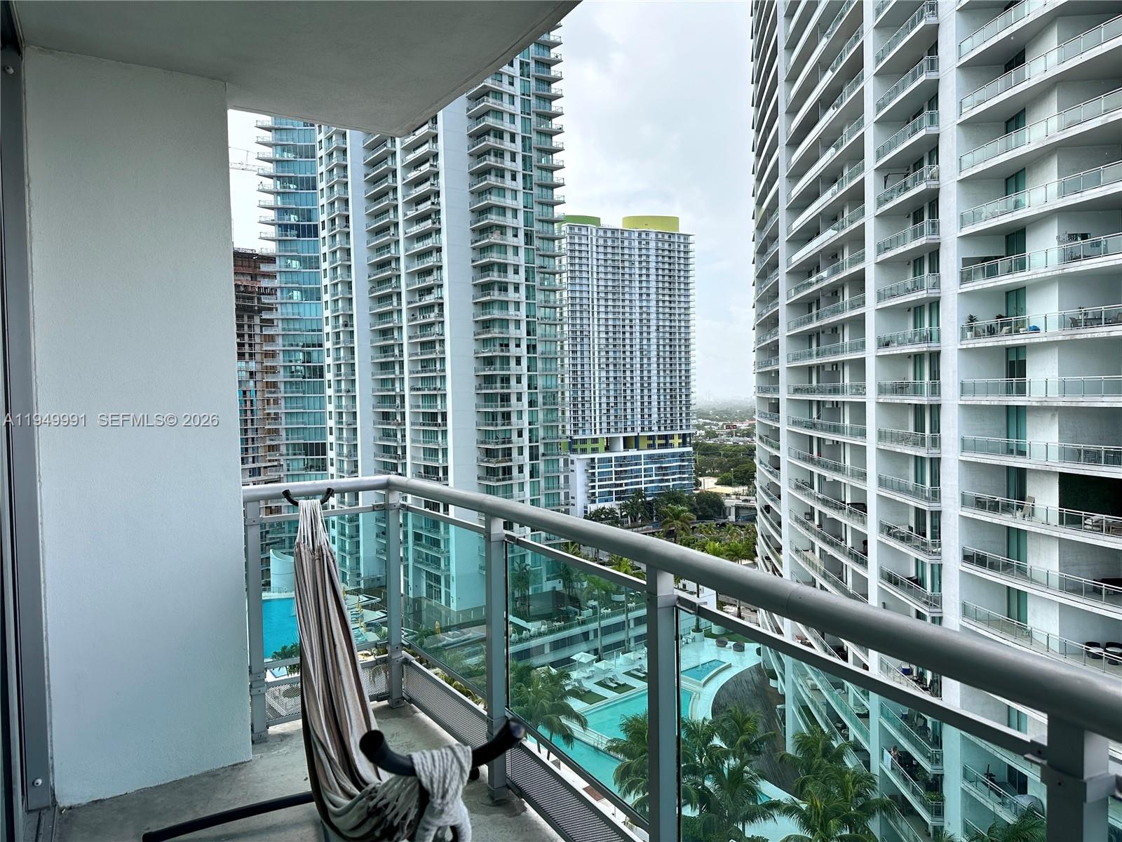 350 South Miami Avenue, Unit 2215 Miami, FL 33130 - Photo 10 of 20 a view of a balcony with chairs
