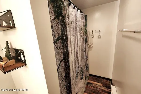 a view of a closet with storage