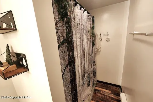 a view of a closet with storage