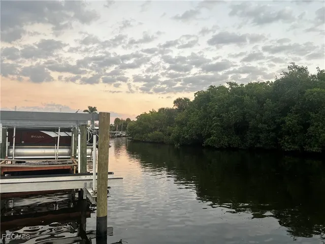 a view of a lake with a outdoor space