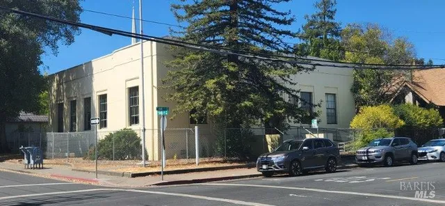 a view of a city street from a house