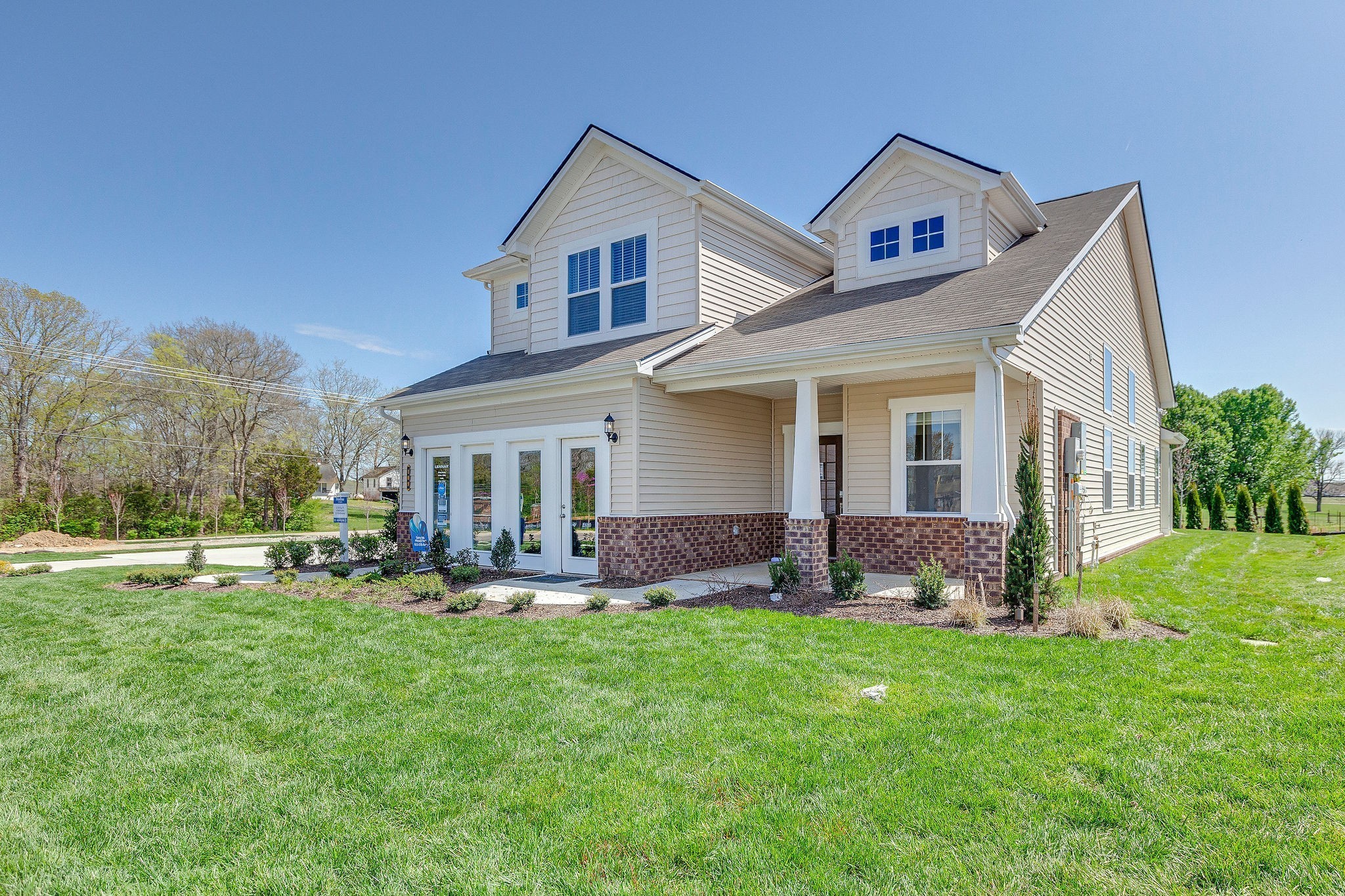 2428 Williams Ridge Drive Columbia, TN 38401 - Photo 22 of 30 a front view of house with a garden and patio