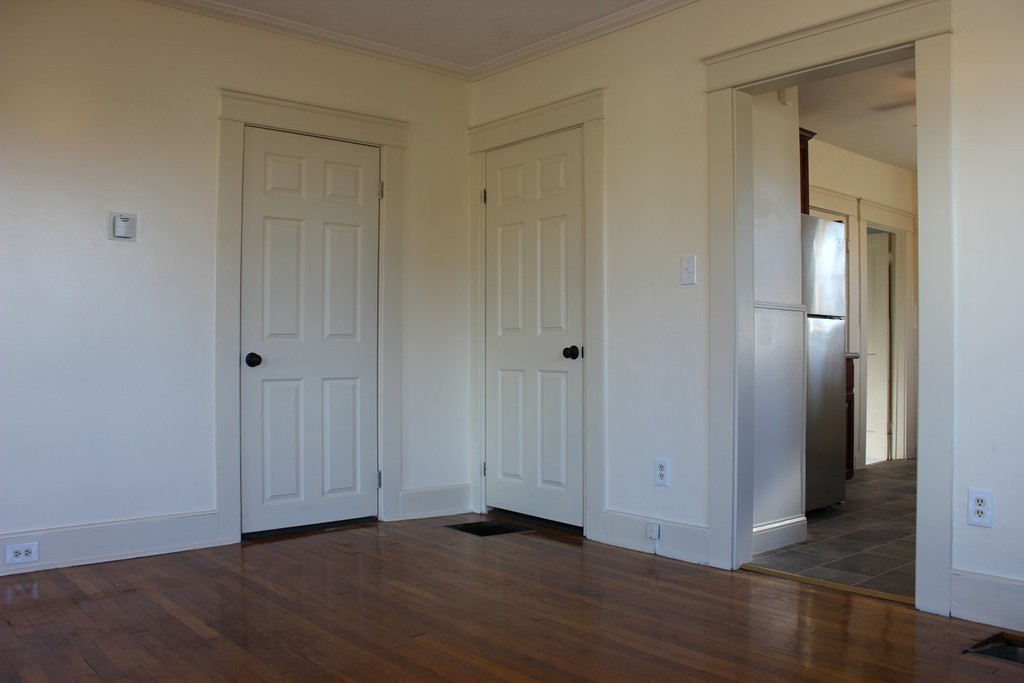 463 Boston Road Billerica, MA 01821 - Photo 12 of 19 a view of an empty room with wooden floor