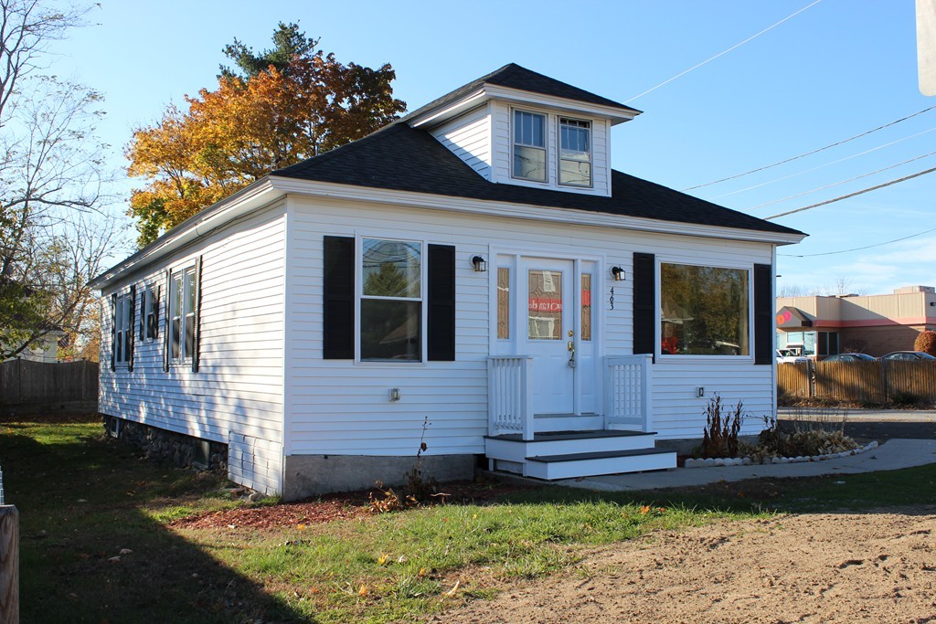 463 Boston Road Billerica, MA 01821 - Photo 2 of 19 a front view of a house with garden