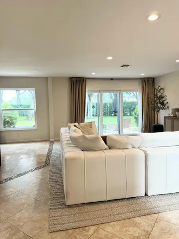 a living room with a large window