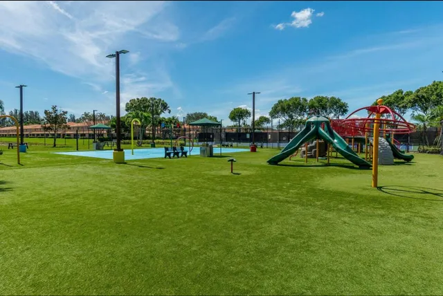 a view of a park with swings