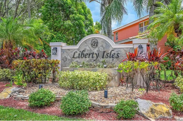 an aerial view of a house a yard and outdoor space