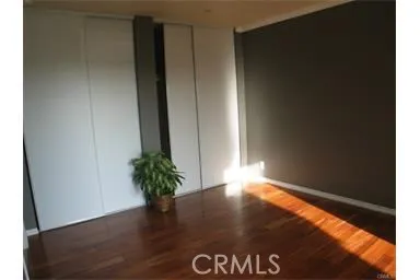 a view of outdoor space with wooden floor