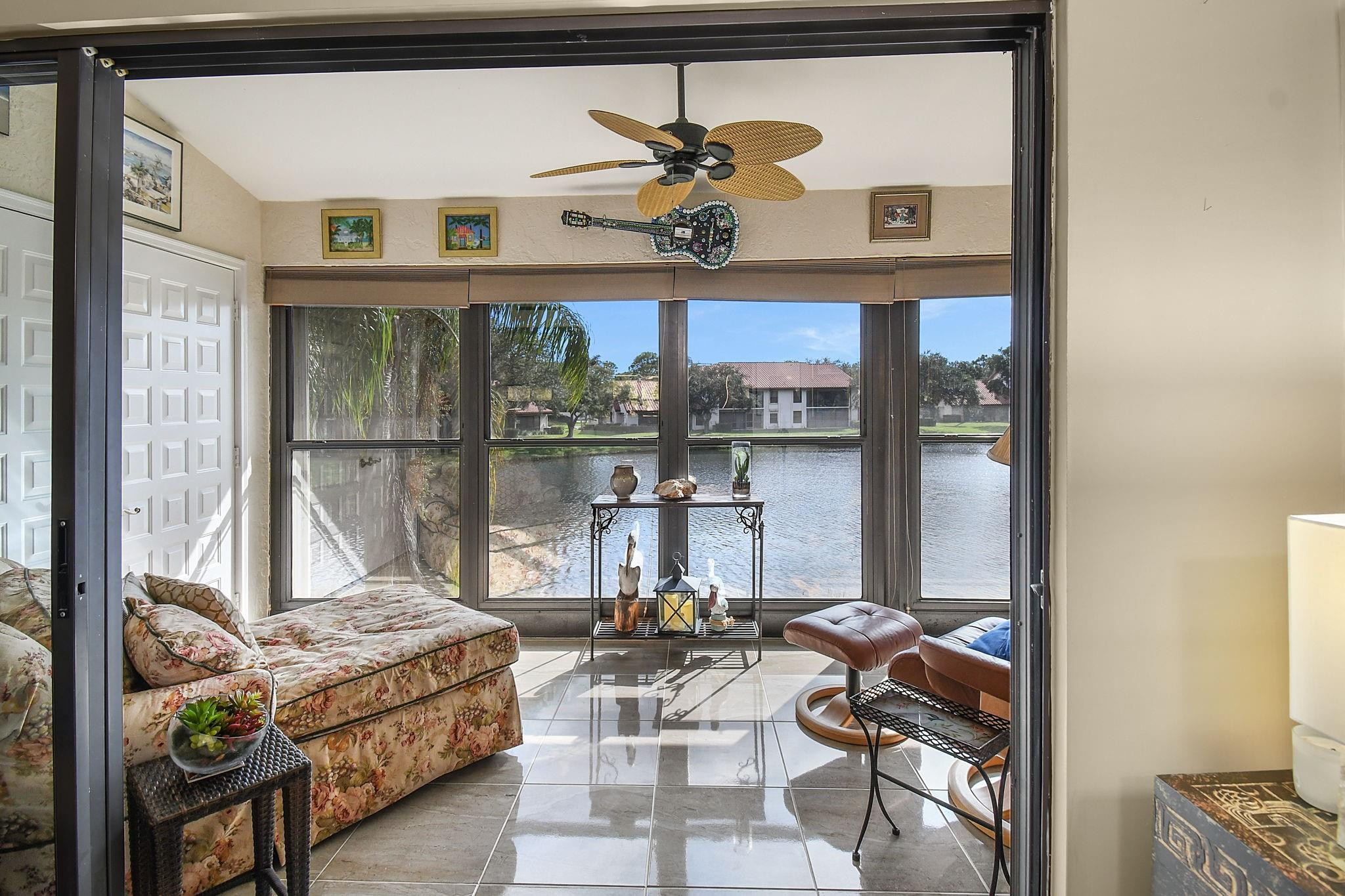 6040 Southeast Martinique Drive, Unit 201 Stuart, FL 34997 - Photo 19 of 63 NICE TILE FLOOR IN LANAI